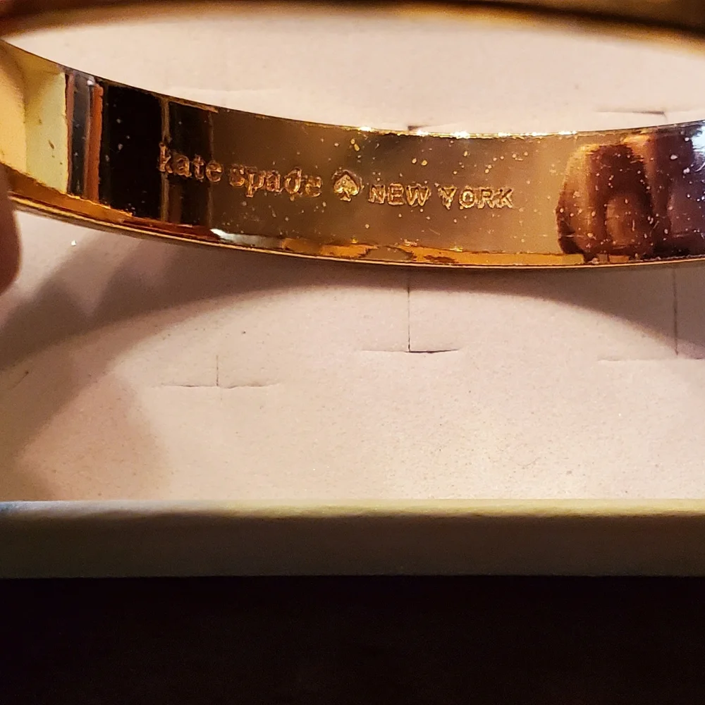Kate Spade Off White Enamel & Gold Tone Logo Hinged Bangle Bracelet - Picture 10 of 13